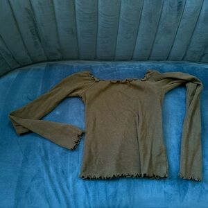 Ruffled black crop top.